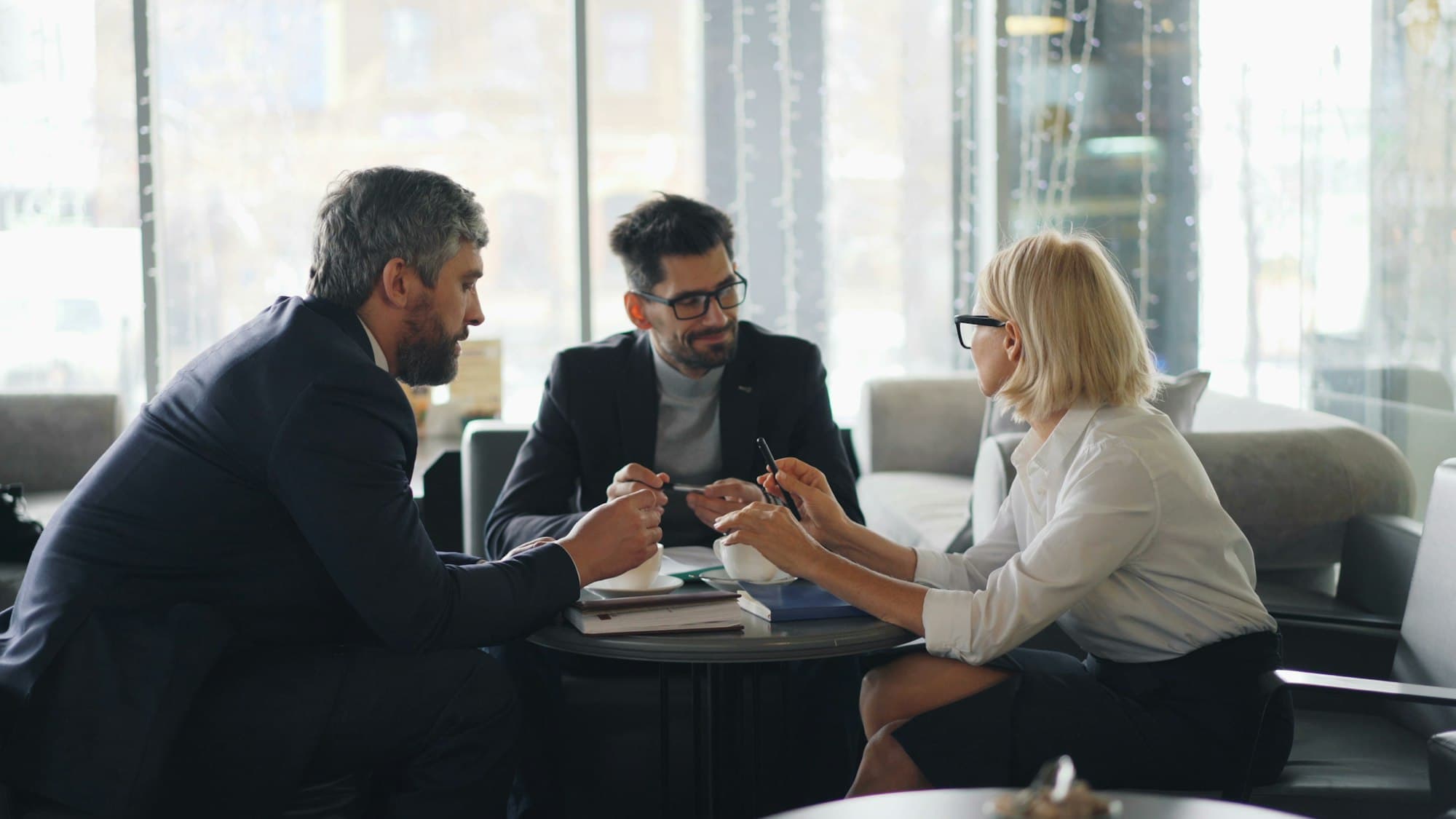 A small group of senior leaders in conversation